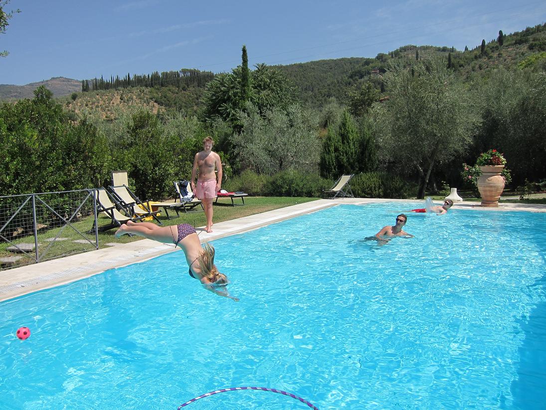 Diving into The pool at Villa degli Olivi 