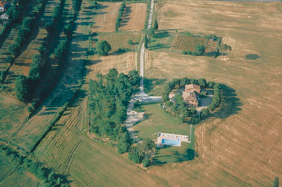 Aerial view of Fattoria Il Musarone near Bettolle, Tuscany. Venue for birthday celebration