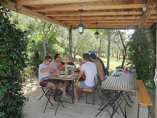 Outdoor dining at Villa degli Olivi. Venue for family reunion.